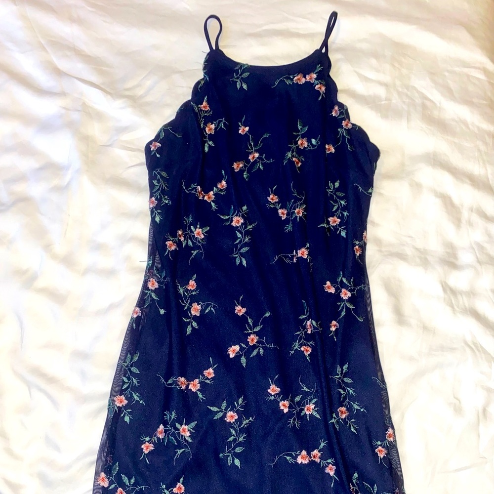 Navy bodycon dress with floral accents